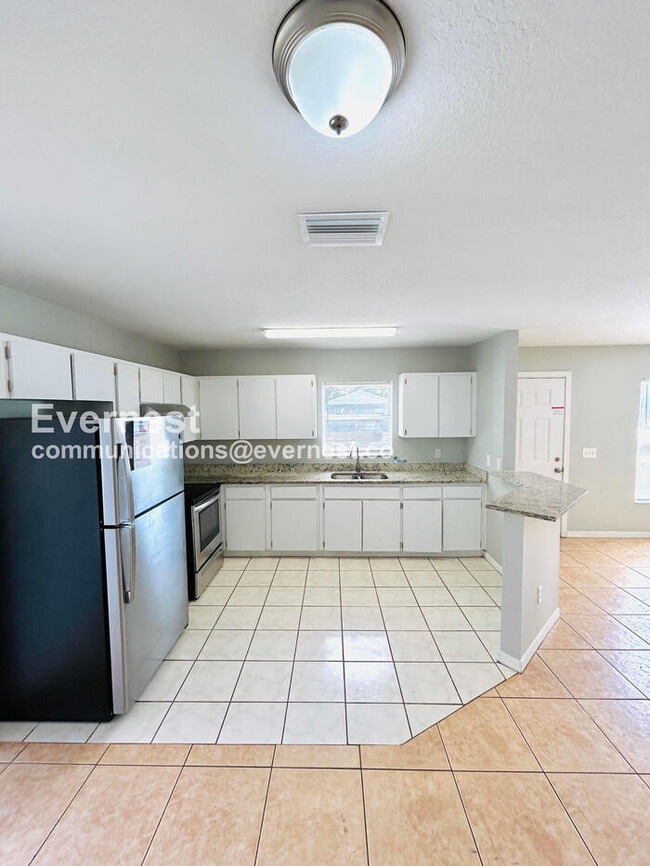 3706 N Garrison St in Tampa, FL - Building Photo - Building Photo