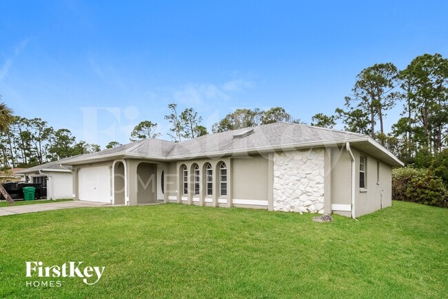 23504 Avacado Ave in Port Charlotte, FL - Building Photo - Building Photo