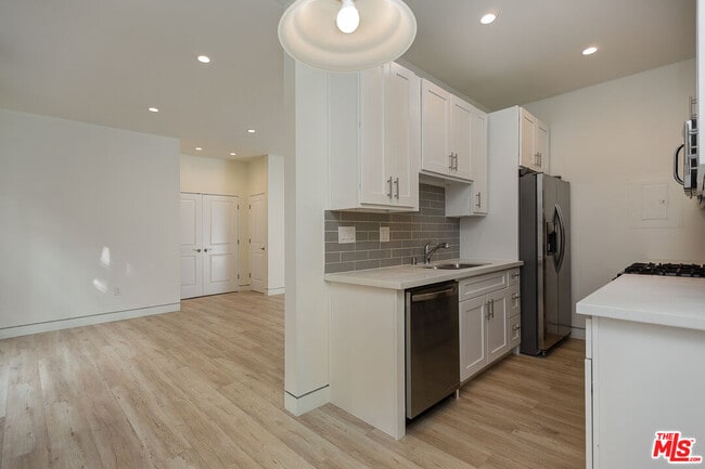 property at 7223 Willoughby Ave