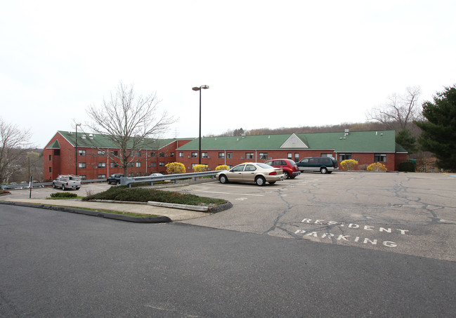 Wequonnoc Village Apartments in Taftville, CT - Building Photo - Building Photo