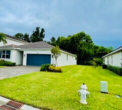 7188 Trotwood Ln in Jupiter, FL - Building Photo - Building Photo