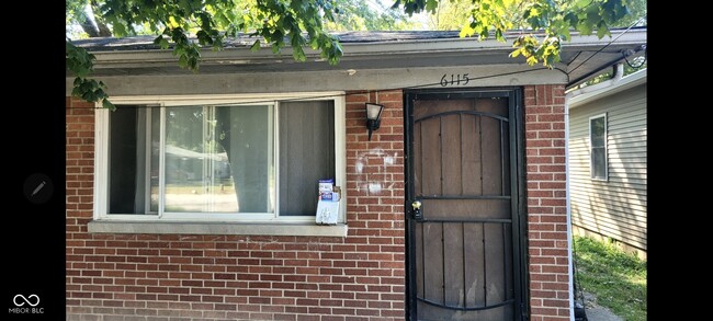 property at 6115 E 12th St