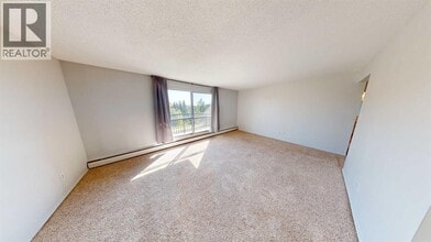 10505-10103 103 St in Grande Prairie, AB - Building Photo - Building Photo