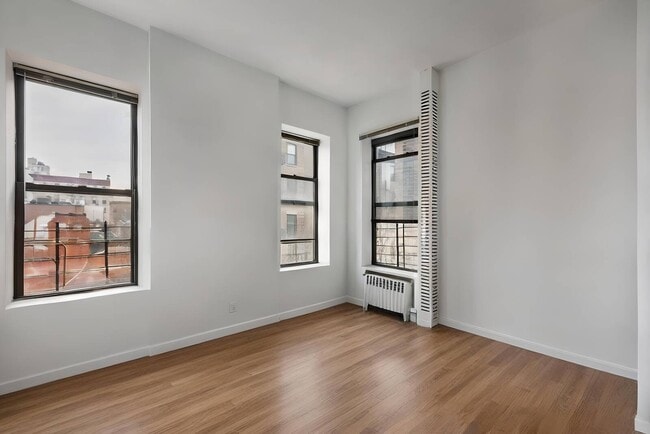 property at 411 Manhattan Ave
