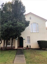 1076 S Redondo Blvd in Los Angeles, CA - Building Photo - Building Photo