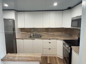 1475 NE 125th Terrace, Unit 614K in North Miami, FL - Building Photo - Building Photo
