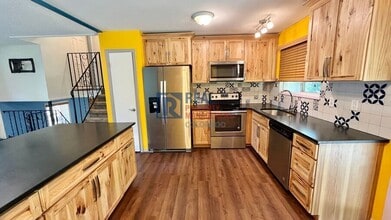 10617 W Lehigh Pl in Lakewood, CO - Building Photo - Building Photo