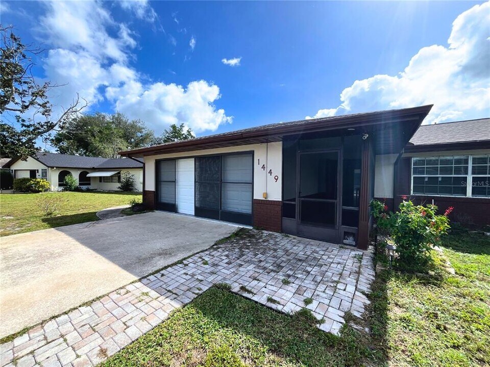 1449 Woffington Ave in Deltona, FL - Building Photo