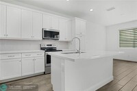 1852 Spoonbill Ct in Deerfield Beach, FL - Foto de edificio - Building Photo