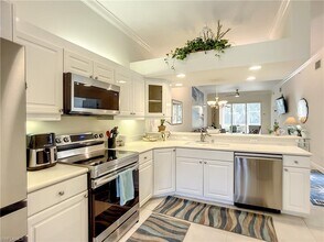 14530 Red Fox Run-Unit -215 in Naples, FL - Building Photo - Building Photo