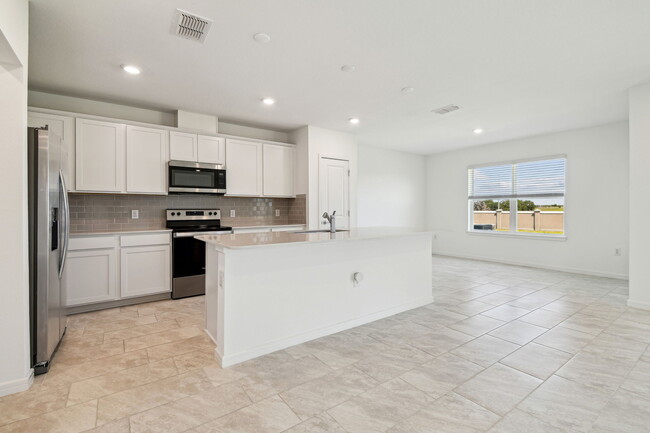 9058 Rally Spring Loop in Wesley Chapel, FL - Building Photo - Building Photo