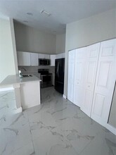 1047 Goldenrod Rd, Unit D in Wellington, FL - Foto de edificio - Building Photo