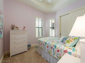 8000 Cordoba Pl in Naples, FL - Building Photo