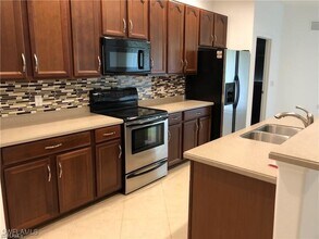 14726 Calusa Palms Dr in Ft. Myers, FL - Building Photo - Building Photo