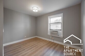 3939 N Janssen Ave, Unit E1 in Chicago, IL - Building Photo - Building Photo