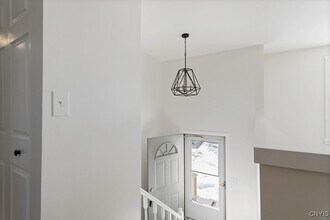 7708 Fitzpatrick Dr in Liverpool, NY - Building Photo - Building Photo