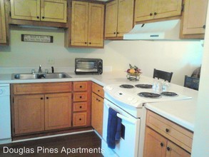 Douglas Pines Apartments in Douglas, GA - Building Photo - Building Photo