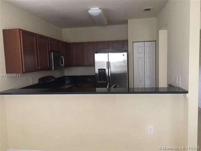 8960 NW 97th Ave-Unit -213 in Doral, FL - Foto de edificio - Building Photo