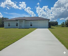 4702 Flora Ave S in Lehigh Acres, FL - Building Photo - Building Photo