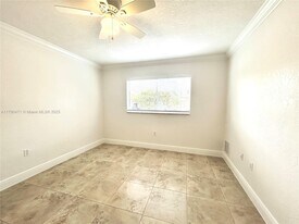 445 SW 11th St, Unit 104 in Miami, FL - Building Photo