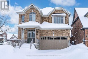 58 Oliver's Mill Rd in Springwater, ON - Building Photo