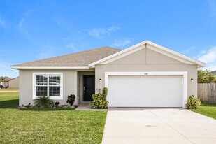 1049 N Platte Way in Poinciana, FL - Building Photo