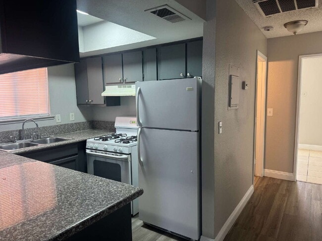 property at 6925 Hopkins Dr