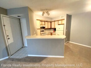 5785 Gatlin Ave-Unit -Unit 715 in Orlando, FL - Building Photo - Building Photo