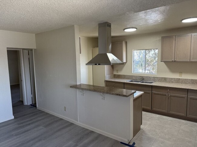 property at 1210 W 104th St