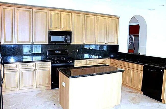 1257 Beacon Cir in Wellington, FL - Building Photo - Building Photo