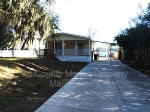 23031 NE 112th Court Rd in Fort McCoy, FL - Building Photo - Building Photo