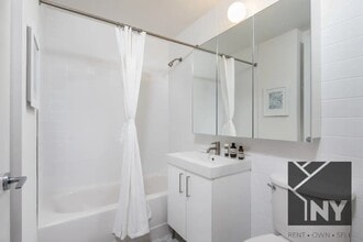 20 William St, Unit 2403 in New York, NY - Building Photo - Building Photo