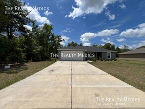 461 Malauka Loop in Ocklawaha, FL - Building Photo - Building Photo