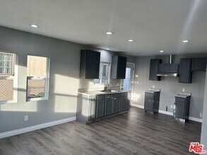 1551 W 55th St in Los Angeles, CA - Building Photo - Building Photo