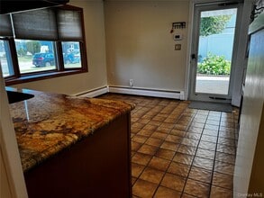12 Elves Ln in Levittown, NY - Building Photo - Building Photo