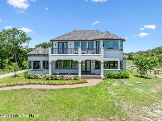 6725 S Tropical Trail in Merritt Island, FL - Building Photo - Building Photo