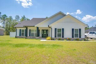 9861 Shangri La West Rd in Milton, FL - Building Photo