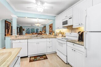 3041 Sandpiper Bay Cir, Unit 201 in Naples, FL - Building Photo - Building Photo