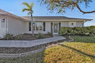 9509 St Paul Dr in Port Charlotte, FL - Building Photo - Building Photo