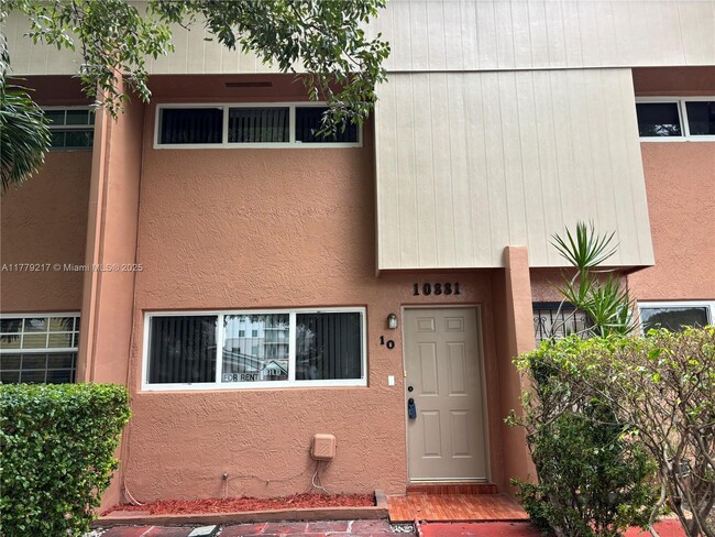 property at 10881 SW 6th St