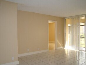 11582 NW 39th St in Coral Springs, FL - Building Photo - Building Photo