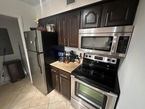 400 Scotia Dr, Unit 103 in Hypoluxo, FL - Building Photo - Building Photo