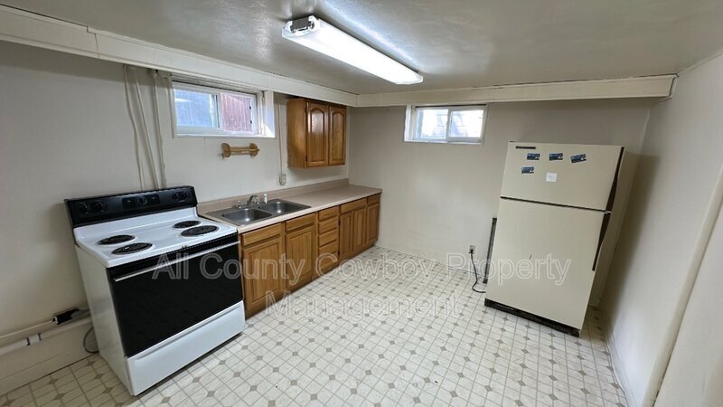 310 S 12th St-Unit -Apt A in Laramie, WY - Building Photo