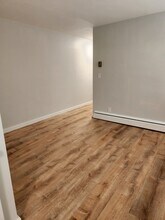 115 E Elm Ave, Unit F1 in Monroe, MI - Foto de edificio - Building Photo