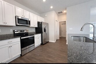 1843 NW 20th Pl in Cape Coral, FL - Building Photo - Building Photo