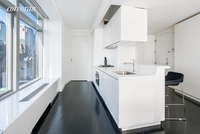 123 Washington St-Unit -: 26A in New York, NY - Building Photo - Building Photo