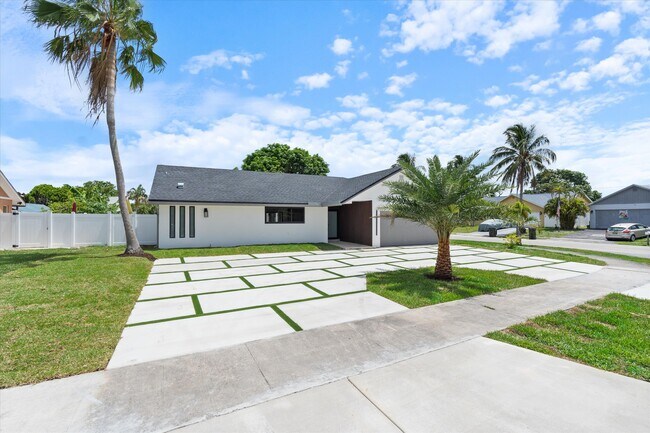 property at 3701 NW 8th St
