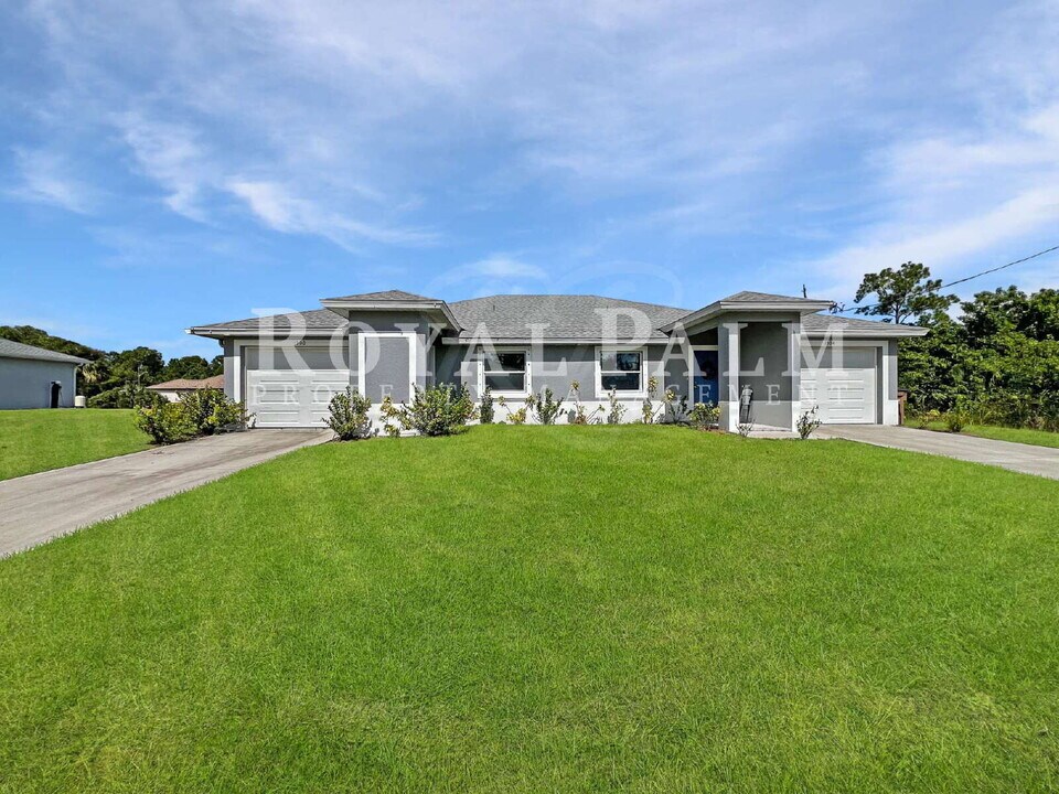 1306 W 12th St in Lehigh Acres, FL - Foto de edificio