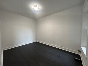 704 W Garfield Blvd, Unit Unit 2 in Chicago, IL - Foto de edificio - Building Photo