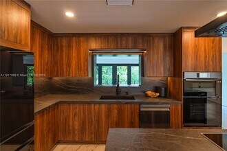 3711 Battersea Rd in Miami, FL - Building Photo - Building Photo